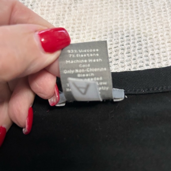 Ann Taylor Women’s Faux Wrap Black Top
Size L - Picture 6 of 8